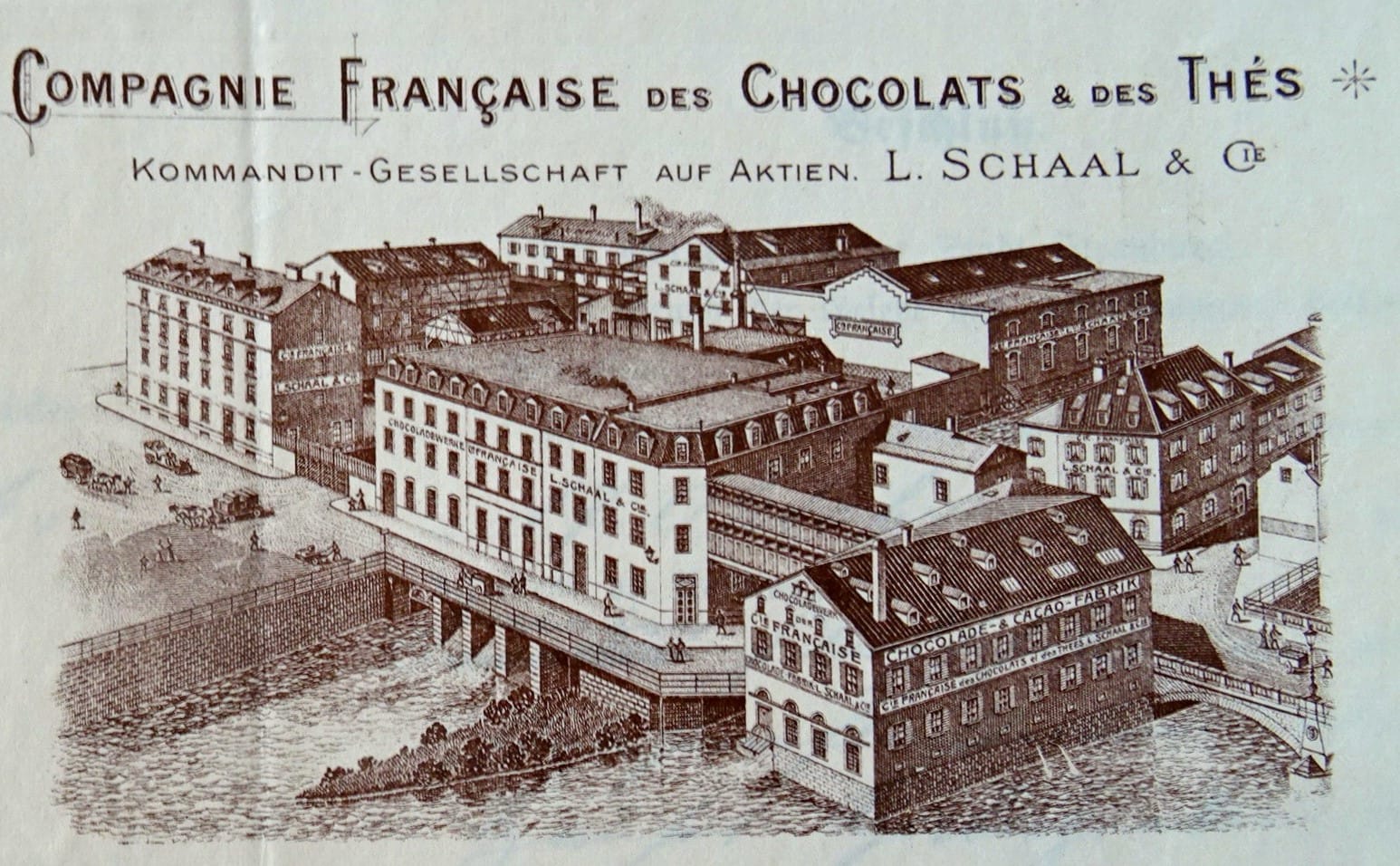 Gravure ancienne de l'usine de la Compagnie française des Chocolats et des Thés, L. Schaal & Cie : de grands bâtiments posés sur l'eau